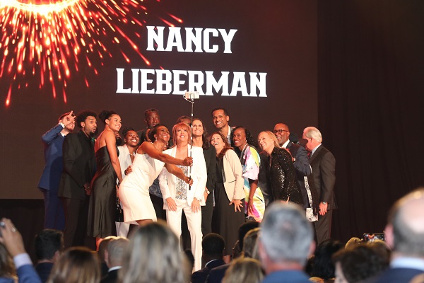 Notables in sports take selfie on stage during Nancy Lieberman Charities Dream Ball Gala at The Factory in Deep Ellum on Sept. 20, 2022