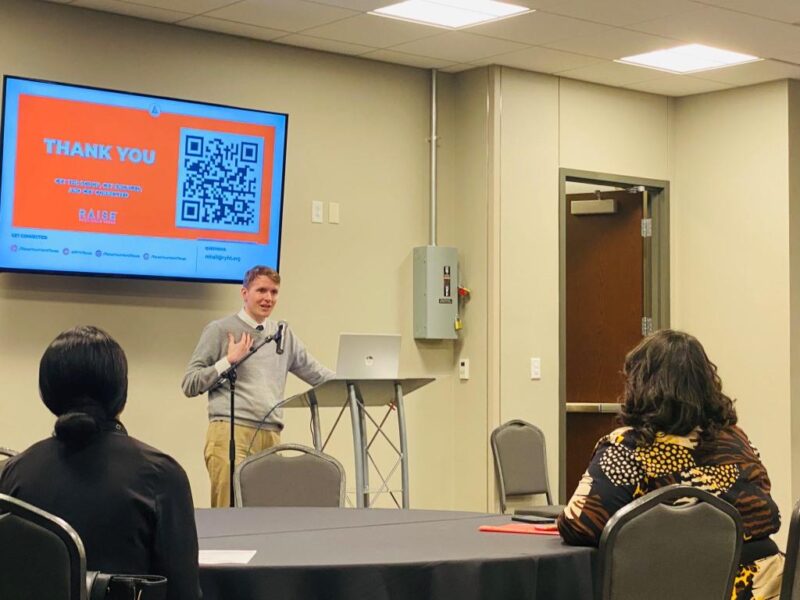 Raise Your Hand Texas Senior Regional Advocacy Director Matthew Hall speaks to audience during Ministry In Civics launch at The Potter's House Dallas March 25, 2023