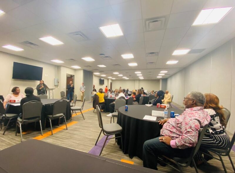 The Potter's House MegaCare Director Tiffany Brinkley speaks to audience during Ministry In Civics launch at The Potter's House Dallas March 25, 2023