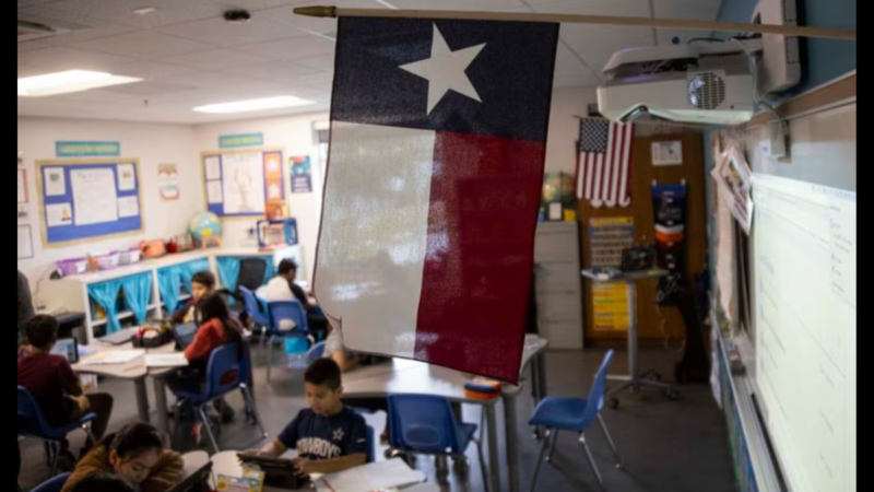 A Texas and American flag